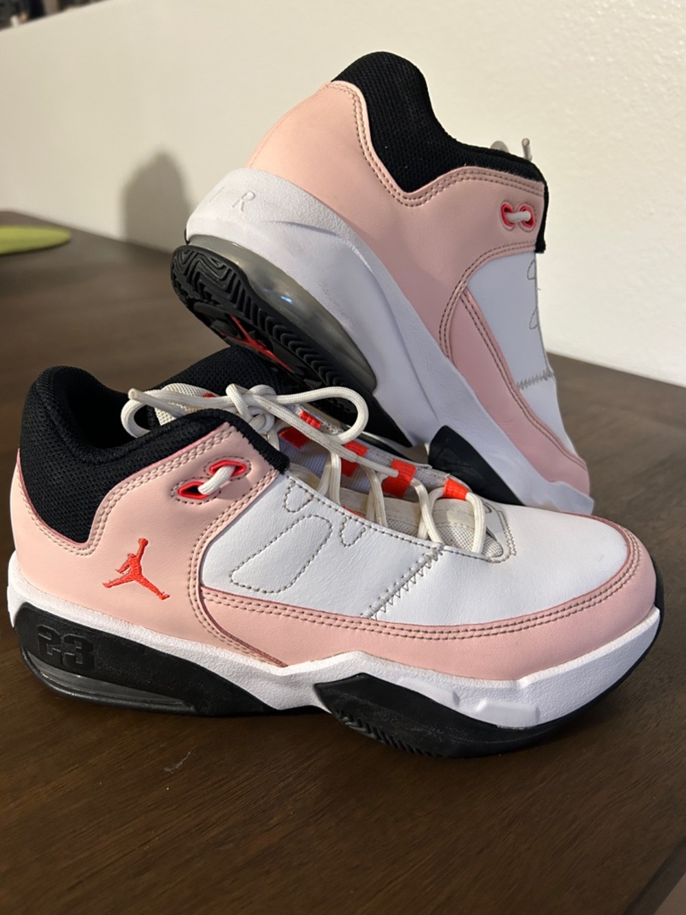 Air Jordan Pink, Black and White on exc condition 5.5 youth